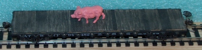 Pig on Flat Car