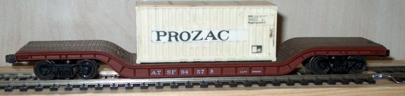 Prozac container on a depressed-center flat car