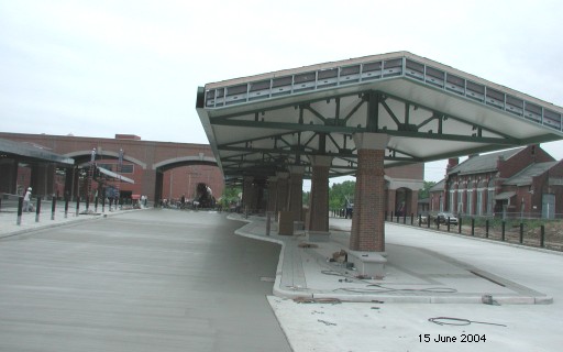 Freshly poured concrete portends buses by July 31