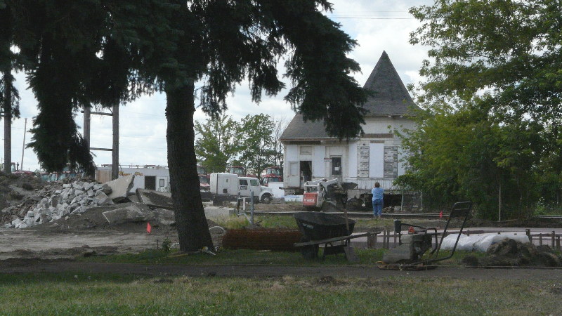 Trees and lawn fill the land once host to the Racine and Southwestern track, long gone before the depot also exited its functional site