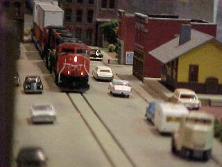 A CN train goes down the street. 63.7K