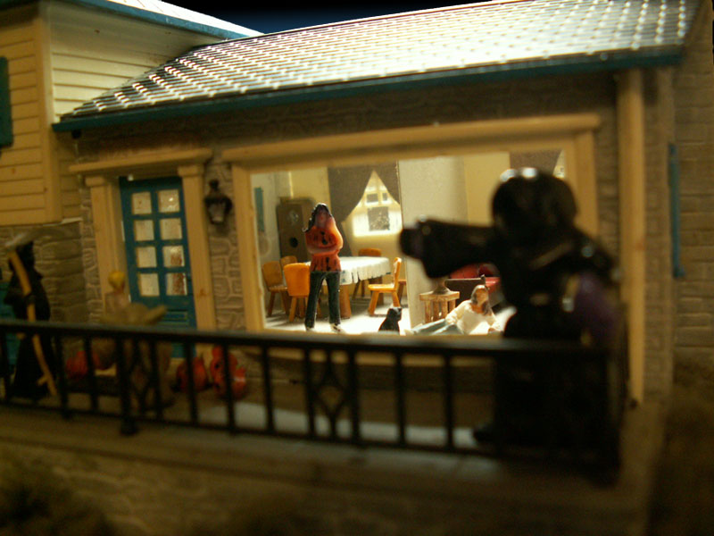 My wife waits near the dinning area for the doorbell to ring