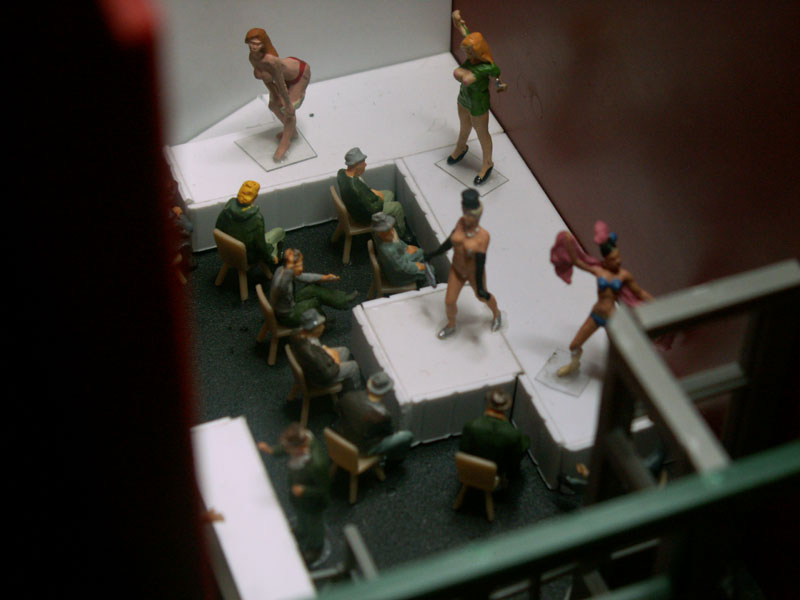 Girls Girls Girls on stage dancing to an old Motely Crue song being played 