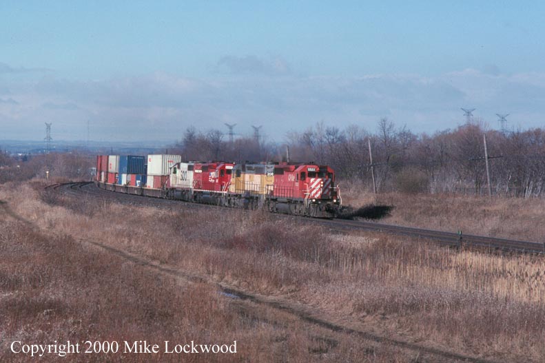 CP 5522, IMRL 208, CP 6607, and Soo 763 eastbount at Lovekin Dec.27, 1997 @ 1142