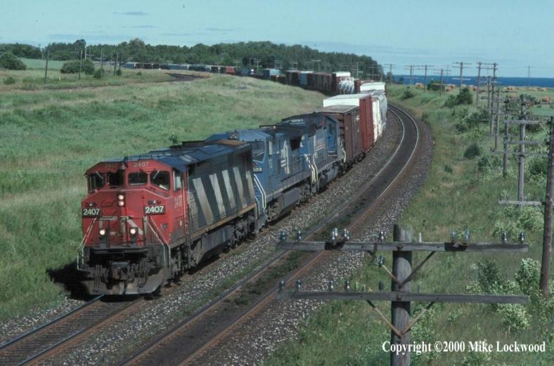 CN 2407, Conrail/LMS 753, and Conrail SD40-2