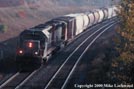 GCFX 6054 & unidentified CN SD40-2W on #309-19 Newtonville Oct.20, 2000 0935
