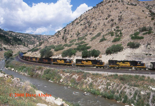 SEVEN D&RGW SD40T-2's are the swing helper in this westbound UP loaded coal train; Nolan's Point, UT 08/19/00